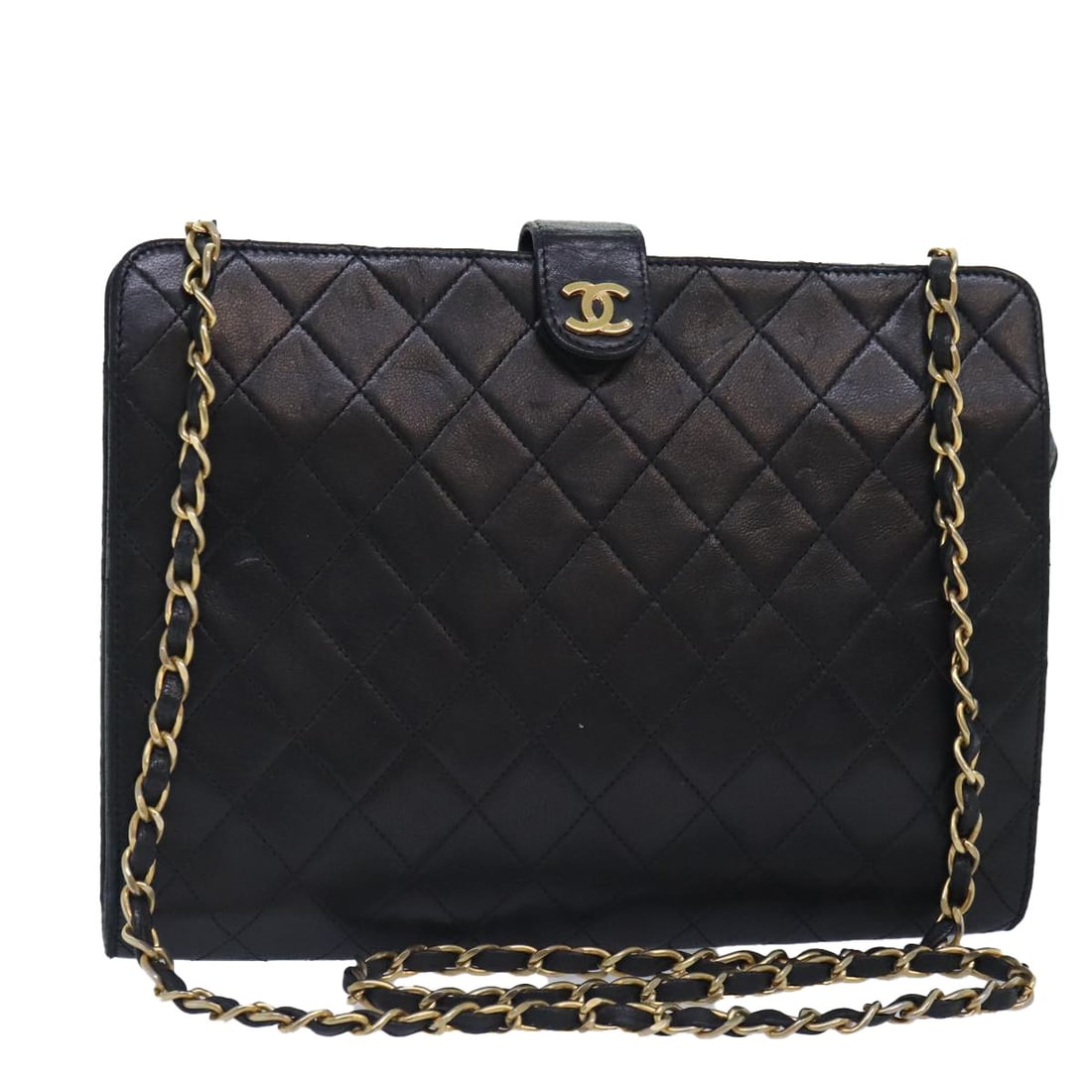 Chanel Black Lambskin Matelasse Shoulder Bag with Gold Chain CC Logo: Chanel Black Lambskin Matelasse Shoulder Bag with Gold Chain CC Logo This CHANEL Matelasse chain shoulder bag is crafted from black lambskin leather with gold-tone accents. The bag features a classic