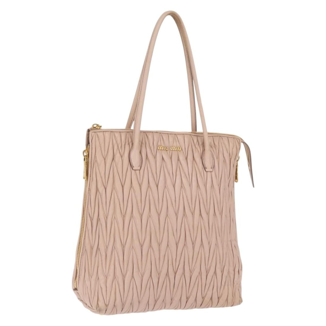Miu Miu Matelasse Pink and Gold Leather Tote Bag from Turkey: Miu Miu Matelasse Pink and Gold Leather Tote Bag from Turkey This Miu Miu Matelasse tote bag features a pink and gold leather exterior with a distinctive quilted design. The bag measures approximately