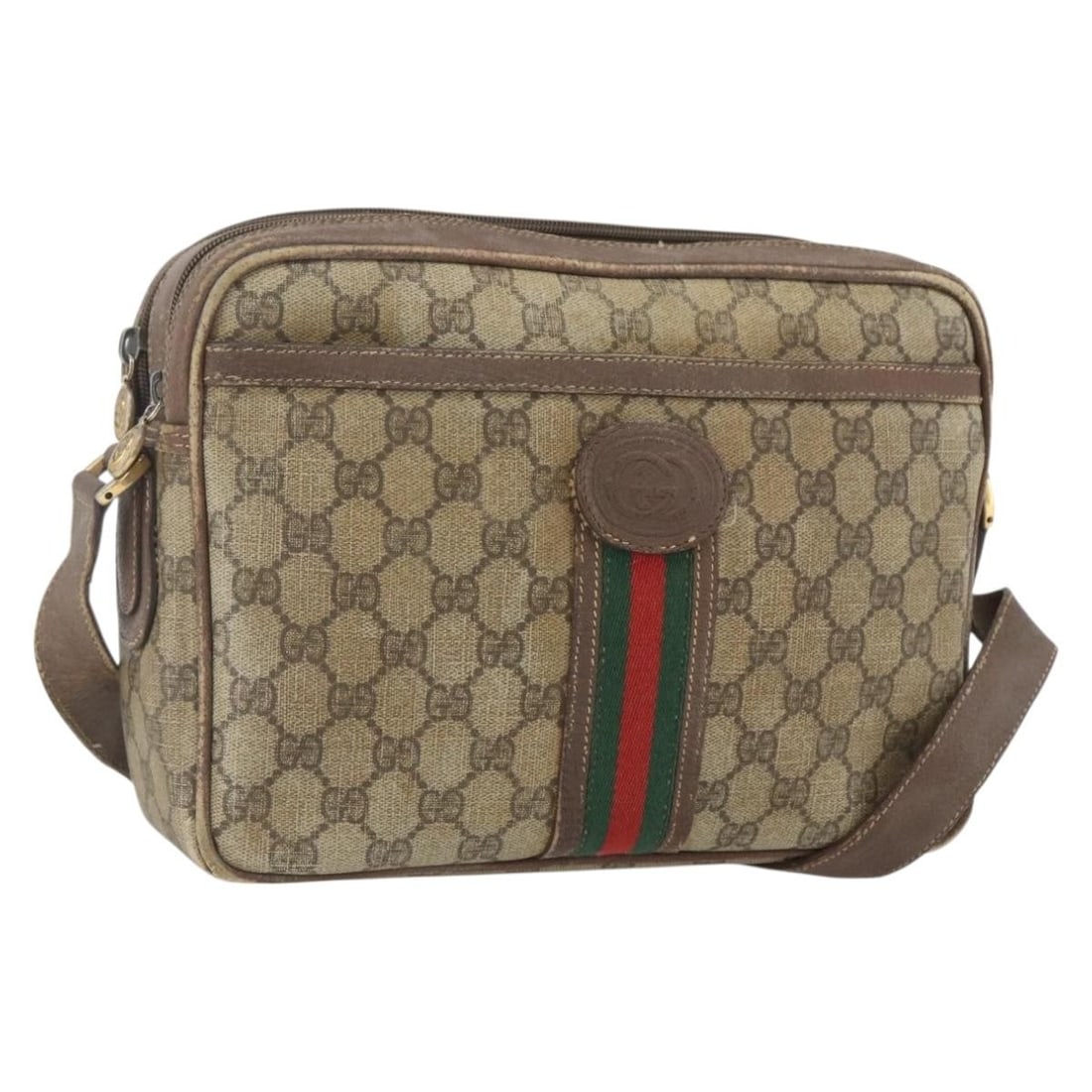 Beige and Gold GG Supreme Web Shoulder Bag by Gucci: Beige and Gold GG Supreme Web Shoulder Bag by Gucci This is a GUCCI GG Supreme Web Sherry Line shoulder bag crafted from beige and gold PVC leather with GG canvas accents. Made in Italy, the bag featu