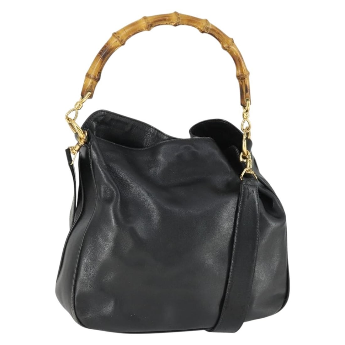 Gucci Bamboo Black Leather Two Way Handbag With Gold Accents And Strap: Gucci Bamboo Black Leather Two Way Handbag With Gold Accents And Strap This is a GUCCI Bamboo 2-way handbag crafted from black leather with gold-tone accents. It features both top handles and a detach