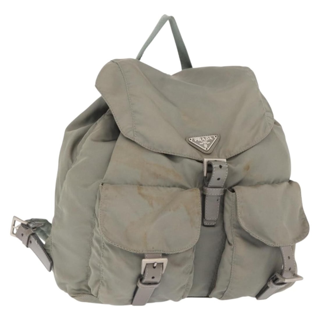 Gray Nylon Prada Backpack Silver Tone Accents Italy: Gray Nylon Prada Backpack Silver Tone Accents Italy This Prada backpack features a gray and silver nylon exterior with silver-tone hardware. Made in Italy, the backpack is designed with practical dime