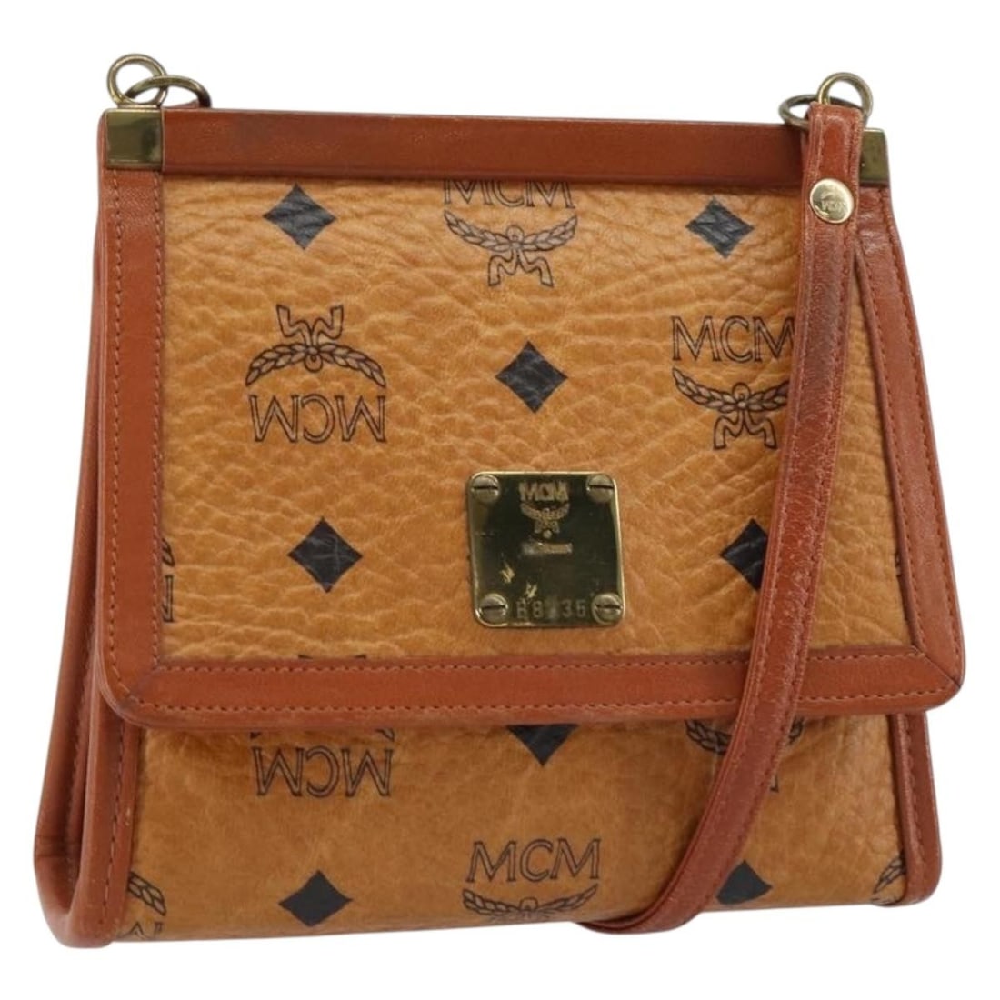 MCM Logogram Vicetos Brown Gold PVC Leather Shoulder Bag BA8870: MCM Logogram Vicetos Brown Gold PVC Leather Shoulder Bag BA8870 This MCM Logogram Vicetos Shoulder Bag is a stylish accessory crafted from durable PVC leather in an elegant brown and gold color combin