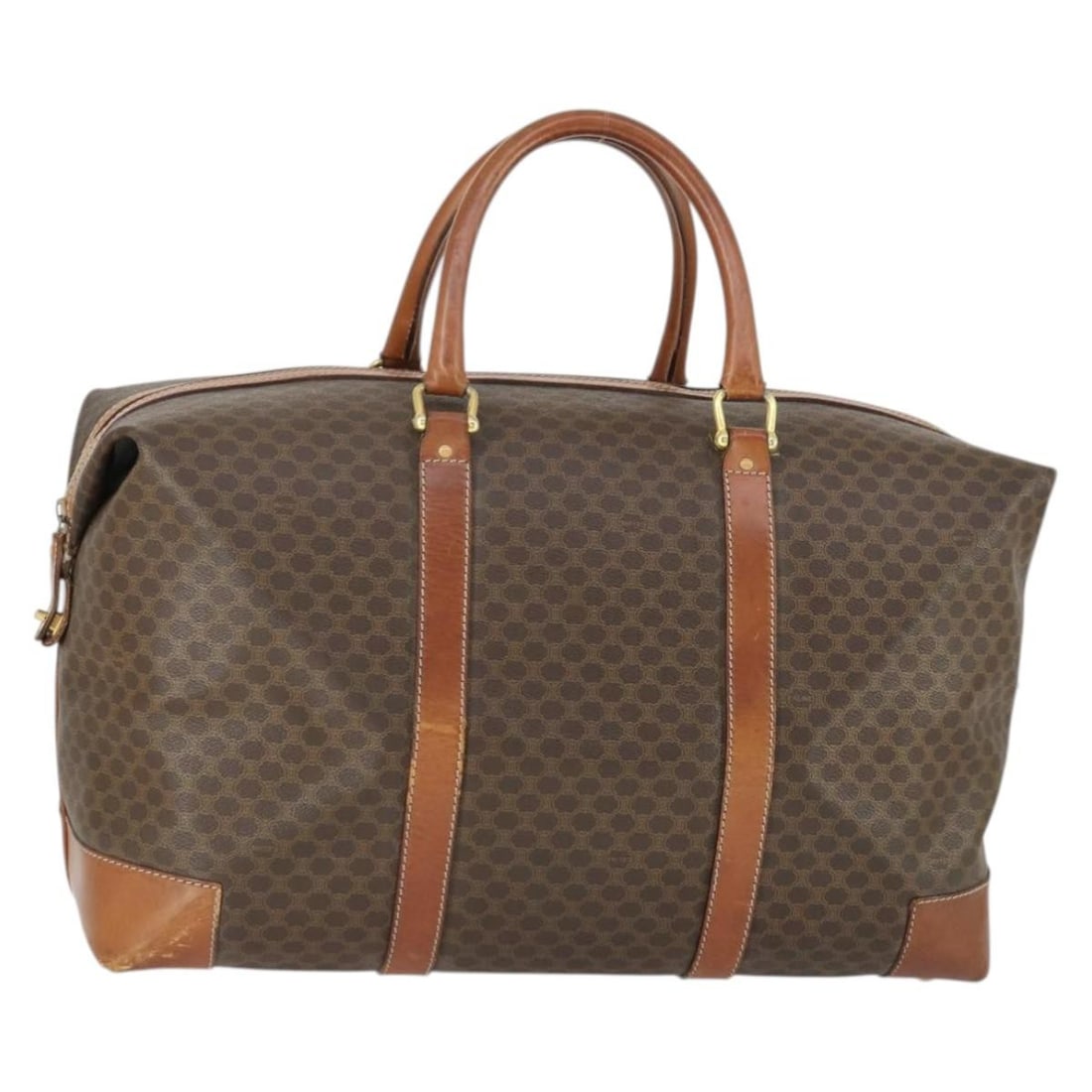 Brown Gold Macadam Canvas and PVC Leather Boston Bag by Celine: Brown Gold Macadam Canvas and PVC Leather Boston Bag by Celine This CELINE Boston Bag features a distinctive Macadam canvas exterior with brown and gold PVC leather accents. Crafted in Italy, the bag