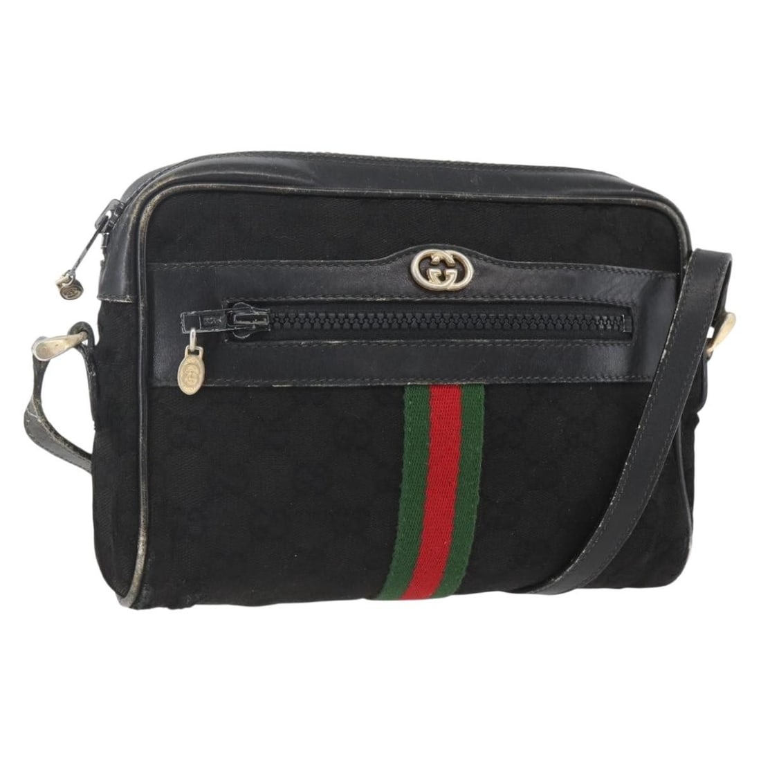 Black GG Canvas Sherry Line Shoulder Bag by Gucci Gold Accent Italy: Black GG Canvas Sherry Line Shoulder Bag by Gucci Gold Accent Italy This is a Gucci GG Canvas Web Sherry Line shoulder bag featuring a black and gold color scheme. Crafted in Italy from GG canvas, thi