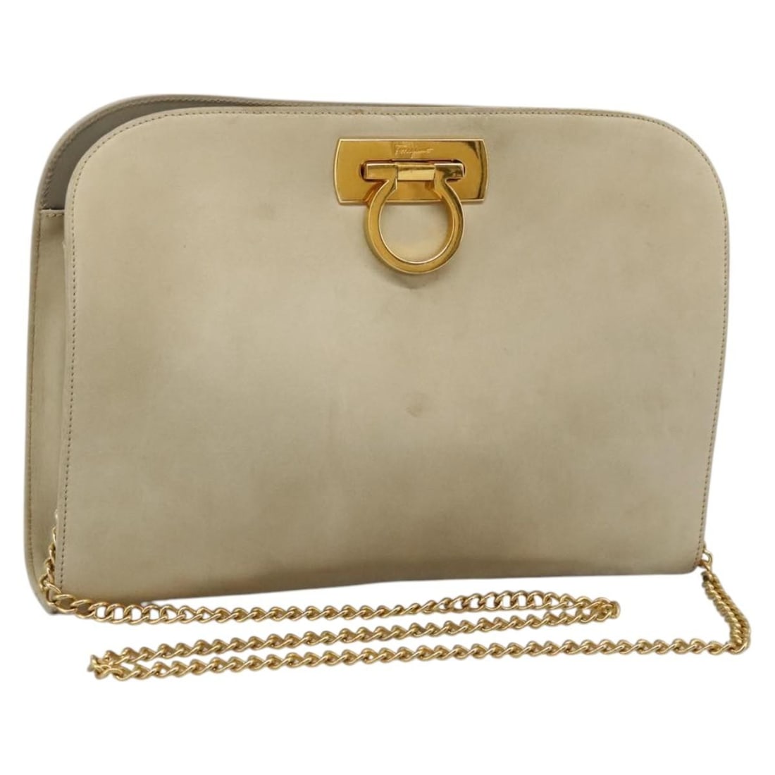 Beige Suede Gancini Chain Shoulder Bag by Salvatore Ferragamo: Beige Suede Gancini Chain Shoulder Bag by Salvatore Ferragamo This Salvatore Ferragamo Gancini chain shoulder bag features a beige suede exterior accented with gold-tone details. Designed for women, t