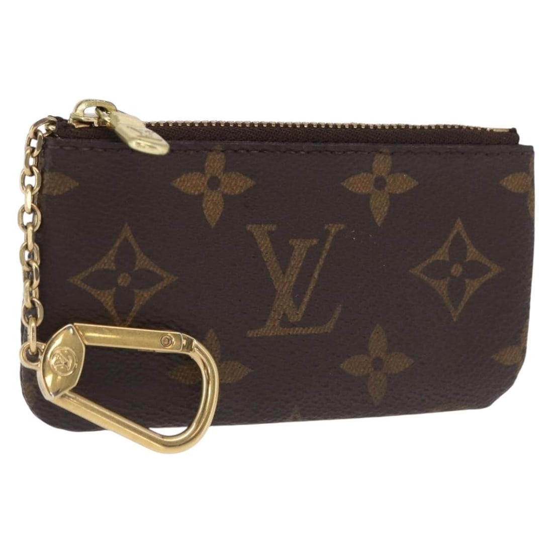 Louis Vuitton M60033 Monogram Canvas Coin Purse Made in France: Louis Vuitton M60033 Monogram Canvas Coin Purse Made in France This Louis Vuitton Monogram Pochette Cles Coin Purse, model M60033, is crafted from signature monogram canvas. It features a compact desi