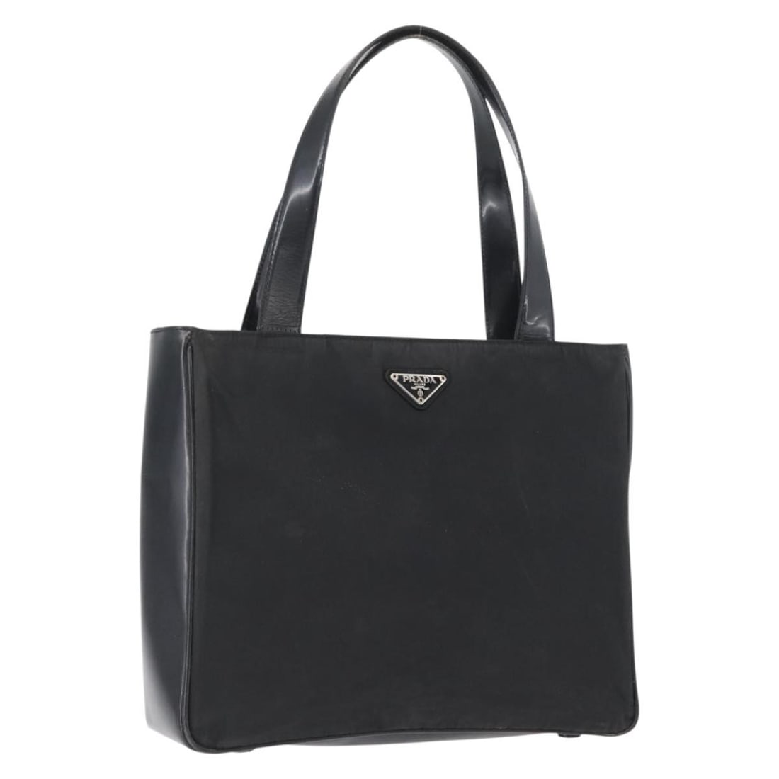 Prada Black Nylon Tote with Silver Hardware Italian Made: Prada Black Nylon Tote with Silver Hardware Italian Made This PRADA women's tote bag is crafted from black nylon with silver-tone accents. Made in Italy, it features a spacious interior suitable for e