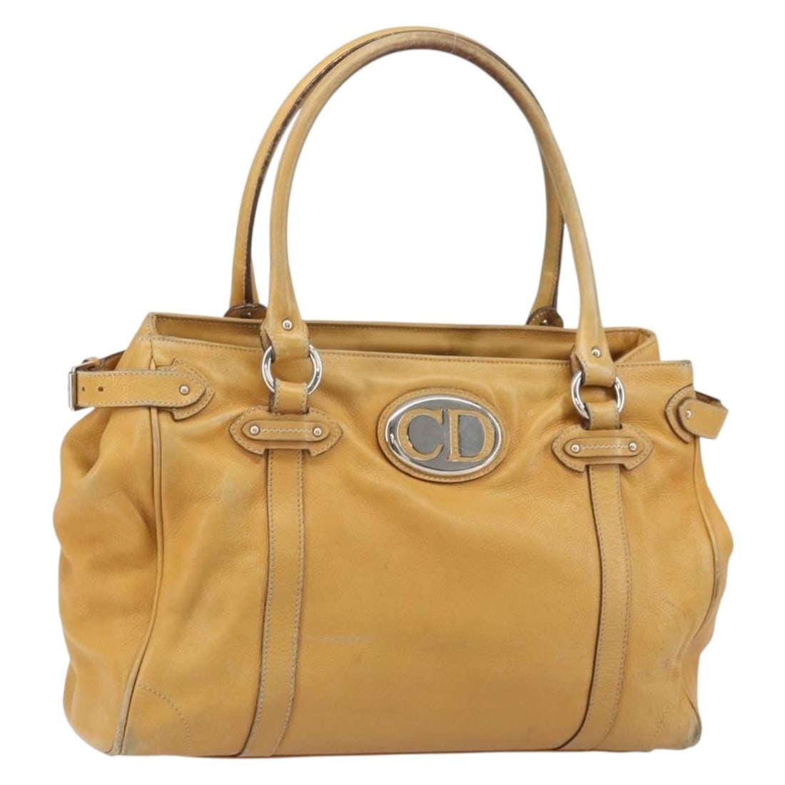 Christian Dior Beige Leather Handbag with Silver Accents Made in Italy: Christian Dior Beige Leather Handbag with Silver Accents Made in Italy This Christian Dior hand bag is crafted from beige and silver leather and features a structured silhouette. Made in Italy, it off