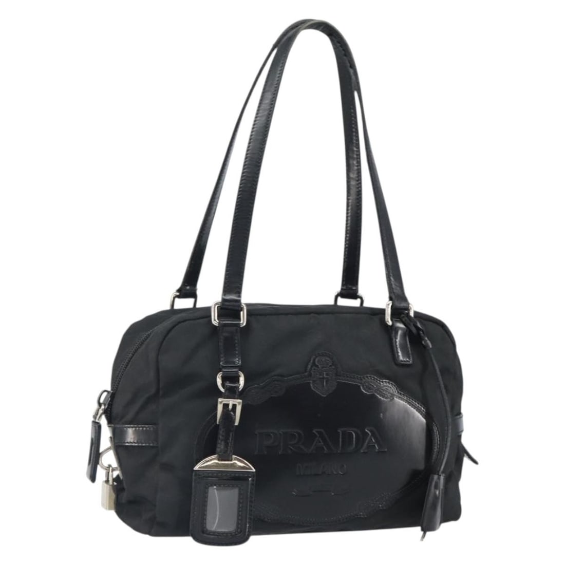 Prada Black Nylon Handbag with Silver Accents and Guarantee Card: Prada Black Nylon Handbag with Silver Accents and Guarantee Card This Prada handbag is crafted from black nylon with silver-tone accents, featuring a structured silhouette. The bag includes dual handl
