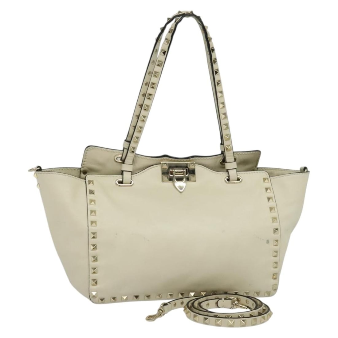 Valentino White Leather Tote with Gold Stud Details Italy: Valentino White Leather Tote with Gold Stud Details Italy This Valentino tote bag is crafted from white leather with gold-tone accents and features the signature studded design. Designed for women, it