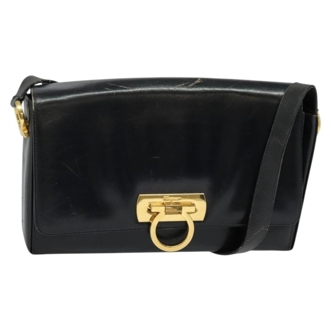 Salvatore Ferragamo Gancini Shoulder Bag Leather Black Gold Italy: Salvatore Ferragamo Gancini Shoulder Bag Leather Black Gold Italy This stylish Salvatore Ferragamo Gancini Shoulder Bag combines luxury and functionality. Crafted from premium leather in a sophisticat