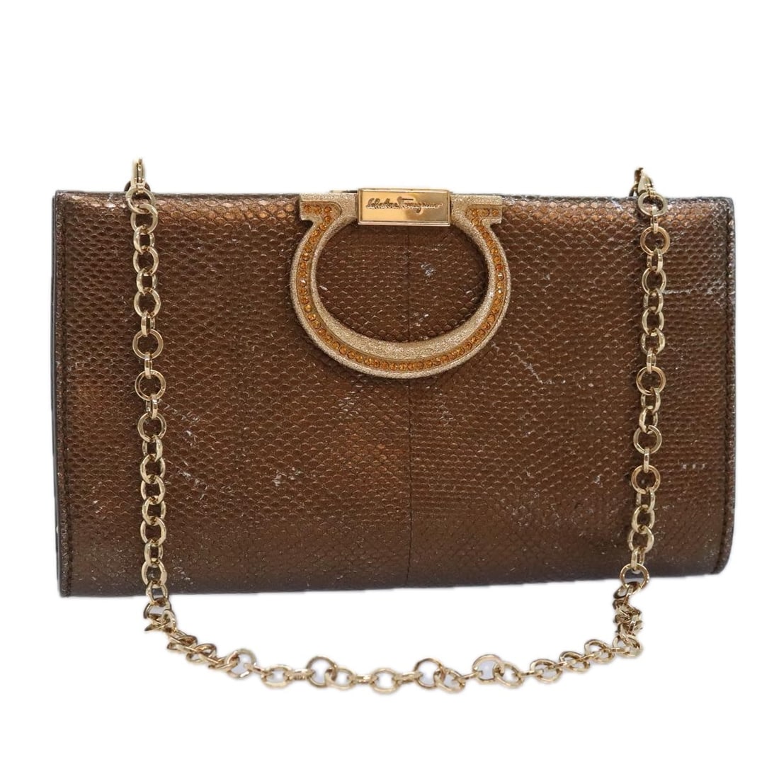 Brown Leather Gancini Shoulder Bag by Salvatore Ferragamo with Chain Strap: Brown Leather Gancini Shoulder Bag by Salvatore Ferragamo with Chain Strap This Salvatore Ferragamo Gancini chain shoulder bag is crafted from brown leather and designed for women. The bag features a