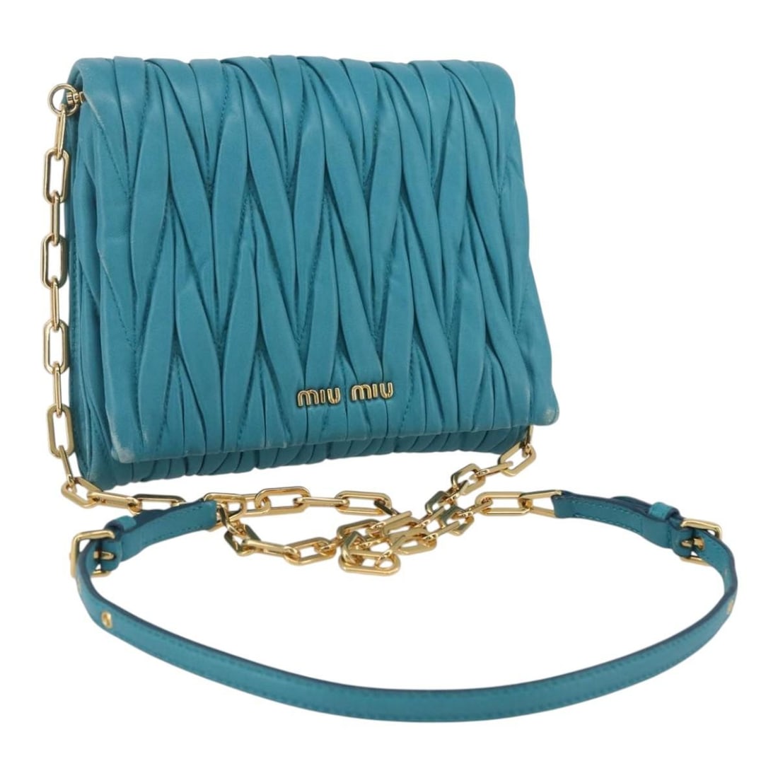 Turquoise Blue Leather Matelasse Shoulder Bag by Miu Miu with Chain Strap: Turquoise Blue Leather Matelasse Shoulder Bag by Miu Miu with Chain Strap This Miu Miu Matelasse chain shoulder bag features turquoise blue leather with gold accents. The compact design includes a cha