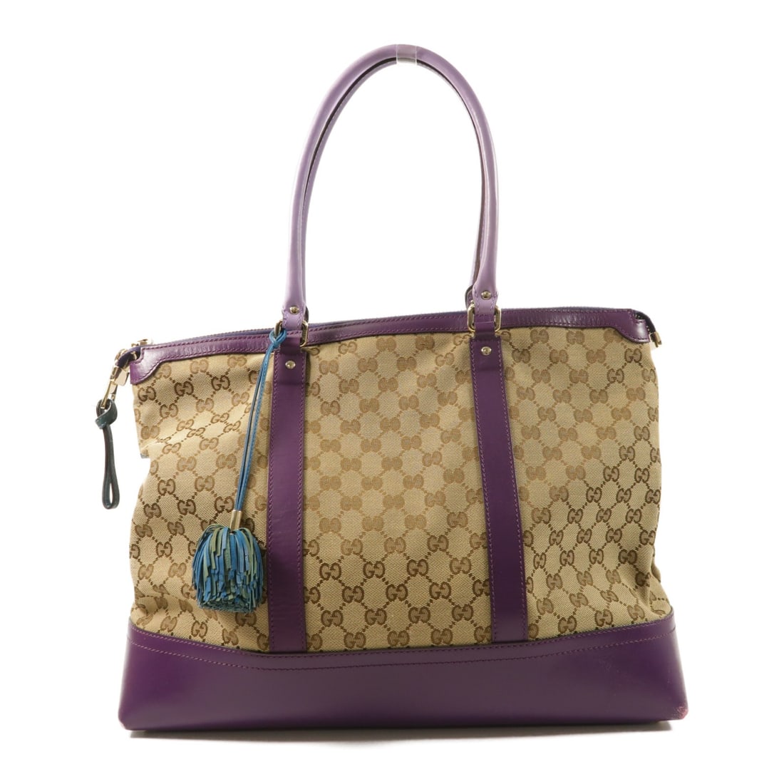 Gucci GG Canvas Black Tote Bag with Gold Hardware: Gucci GG Canvas Black Tote Bag with Gold Hardware This GUCCI tote bag features the signature GG canvas exterior in black, complemented by gold-tone hardware. Designed for women, the bag offers a spaci