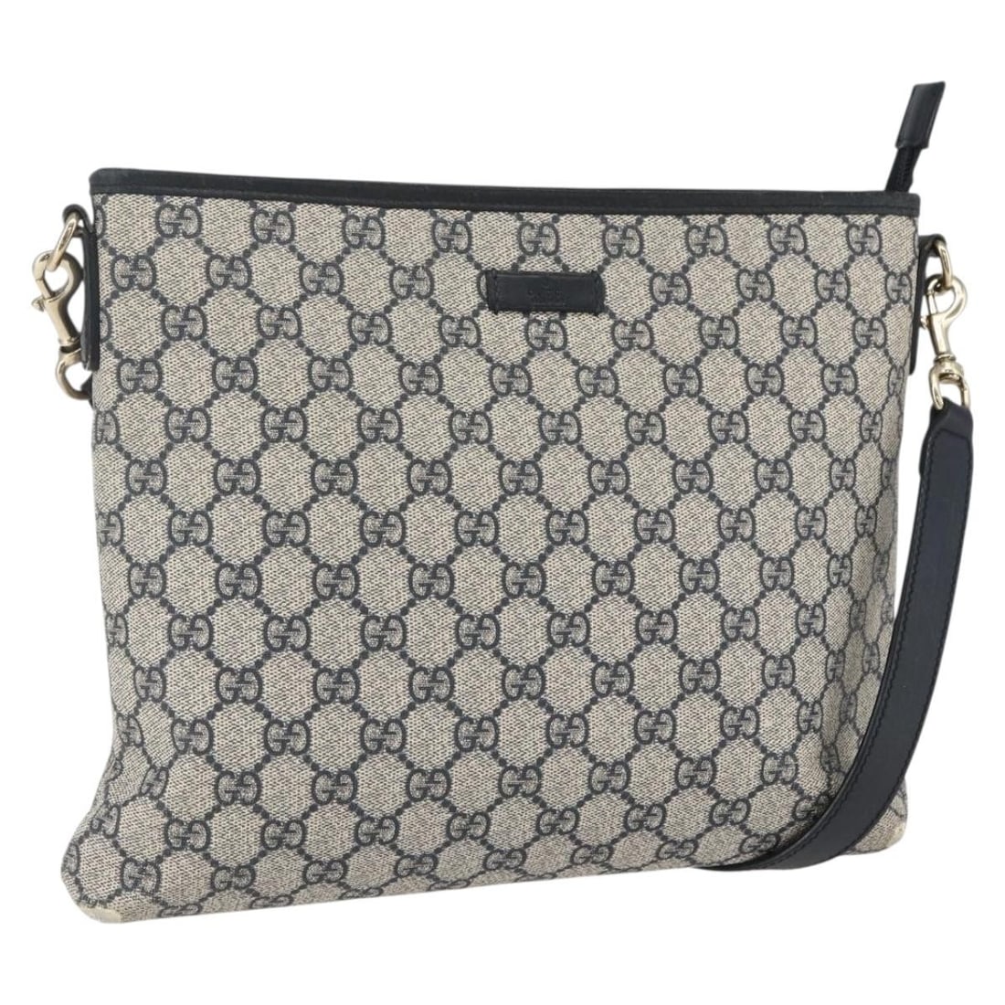 Gucci GG Supreme Navy PVC Shoulder Bag Model 388924 Italy: Gucci GG Supreme Navy PVC Shoulder Bag Model 388924 Italy This is a Gucci GG Supreme shoulder bag crafted from PVC leather and GG canvas in navy and gold tones. The bag features an adjustable shoulder