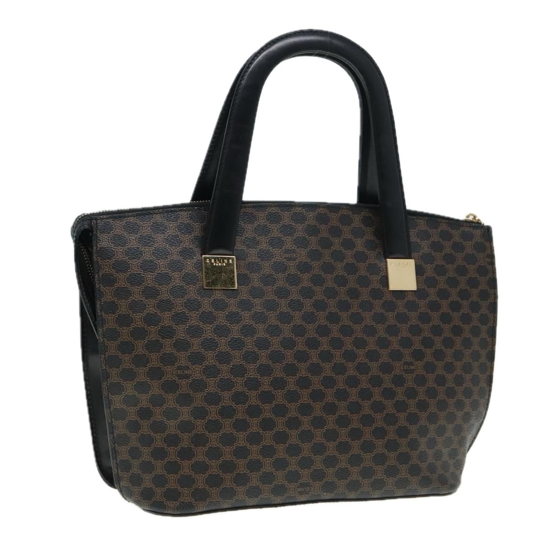 Celine Macadam Black PVC Canvas Handbag for Women Made in Italy: Celine Macadam Black PVC Canvas Handbag for Women Made in Italy This CELINE Macadam canvas hand bag features a black PVC leather exterior with the iconic Macadam pattern. Designed for women, it is mad