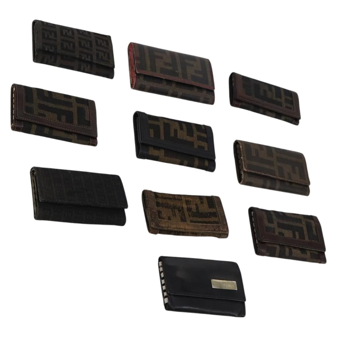 FENDI Zucchino Leather Key Case Set of 10 Brown Black Auth: FENDI Zucchino Leather Key Case Set of 10 Brown Black Auth This Fendi Zucchino Key Case is a stylish accessory crafted from leather and features a chic brown and black color combination. Designed for