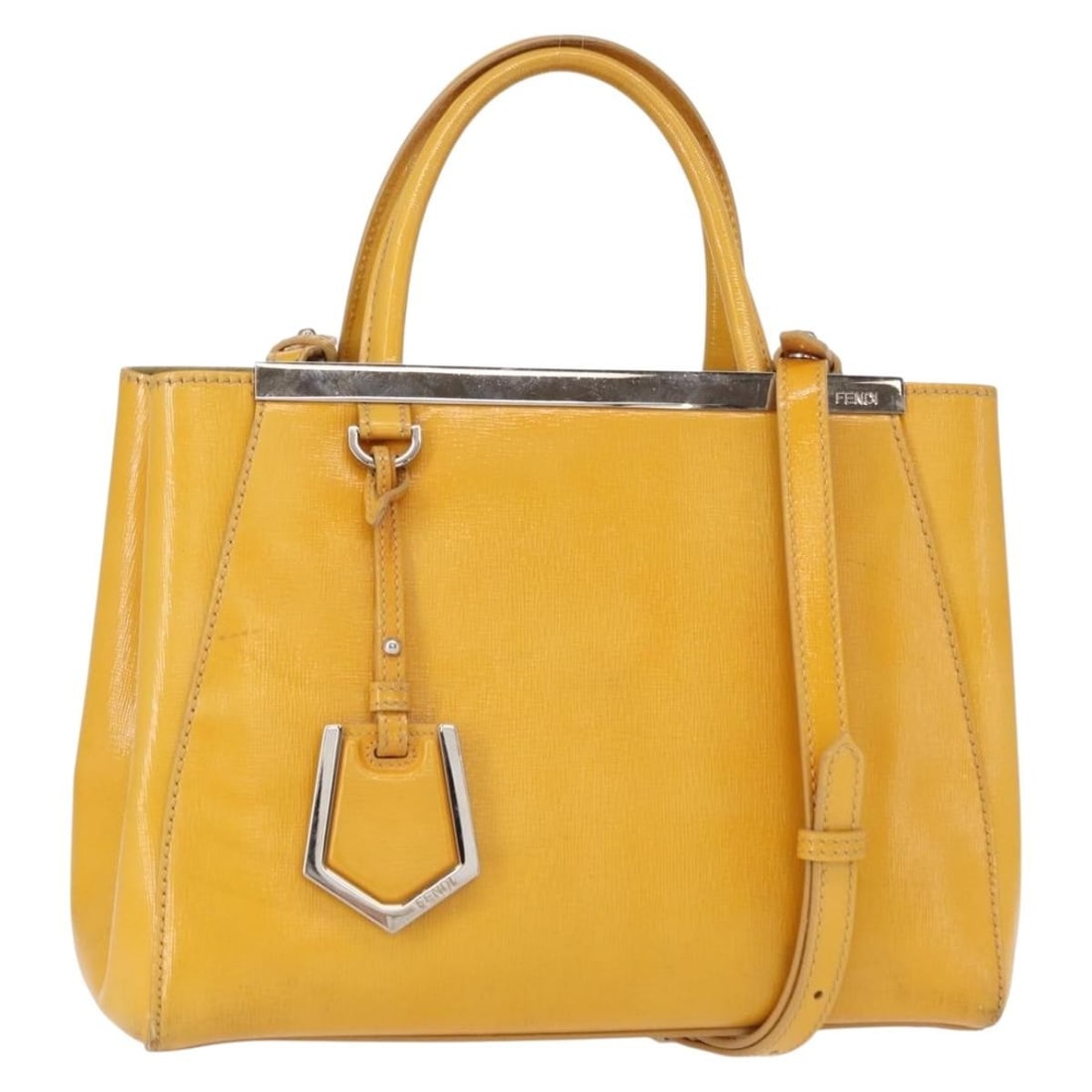 FENDI 2 JOURS Leather Hand Bag Yellow Silver Authentic: FENDI 2 JOURS Leather Hand Bag Yellow Silver Authentic Introducing the Fendi 2 Jours Hand Bag, a sophisticated accessory crafted in Italy. This stylish handbag features a vibrant yellow and silver lea
