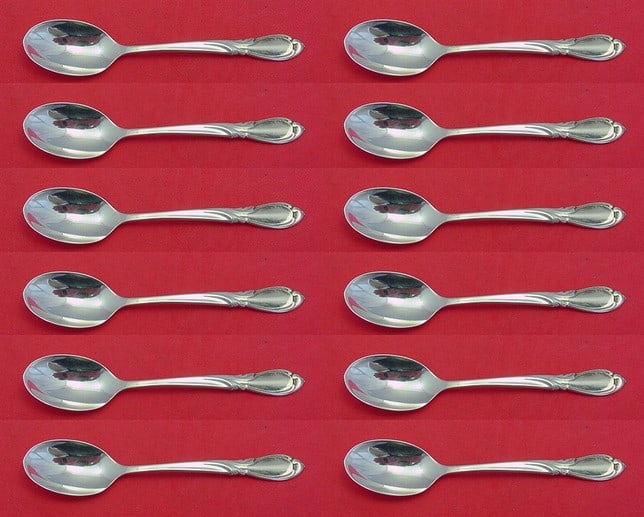International Sterling Silver Rhapsody New Demitasse Spoon Set of 12pcs 4 1/4in: International Sterling Silver Rhapsody New Demitasse Spoon Set of 12pcs 4 1/4in This elegant set of 12 demitasse spoons features the exquisite Rhapsody New pattern by International, crafted from high-
