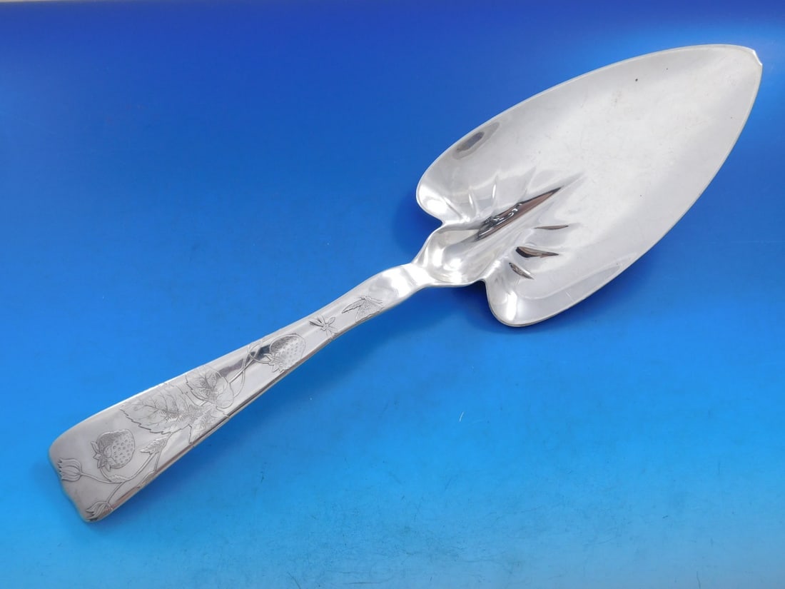 Tiffany Sterling Silver Spade Server 13 1/8 Strawberry Motif Lap Over Edge: Tiffany Sterling Silver Spade Server 13 1/8 Strawberry Motif Lap Over Edge This exquisite spade server, crafted by Tiffany & Co., features a stunning strawberry motif and showcases the elegant Lap Ove