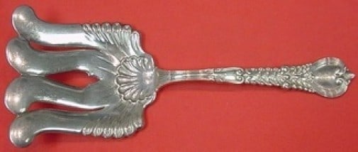 Tiffany & Co Florentine Sterling Silver Asparagus Fork 9.5 Fancy Tines: Tiffany & Co Florentine Sterling Silver Asparagus Fork 9.5 Fancy Tines Enhance your dining experience with this exquisite Florentine asparagus fork by Tiffany & Co. Crafted from high-quality sterling