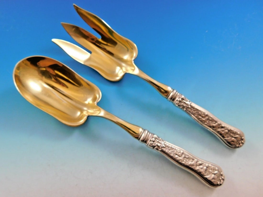 Tiffany & Co Olympian Sterling Silver Salad Serving Set 9 1/4": Tiffany & Co Olympian Sterling Silver Salad Serving Set 9 1/4" Introducing the Olympian Salad Serving Set by Tiffany & Co, a stunning example of craftsmanship in sterling silver. This exquisite set fe