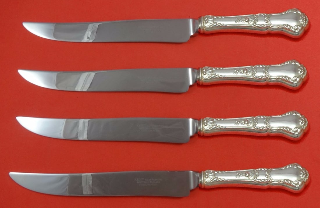 Gorham Baronial Old Sterling Silver 4pc Texas Steak Knife Set: Gorham Baronial Old Sterling Silver 4pc Texas Steak Knife Set Elevate your dining experience with this exquisite 4-piece steak knife set from Gorham's Baronial Old pattern. Crafted from high-quality s