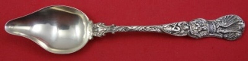 Durgin Heraldic Sterling Silver Melon Spoon 5 5/8 Inches: Durgin Heraldic Sterling Silver Melon Spoon 5 5/8 Inches This exquisite melon spoon, measuring 5 5/8 inches, is crafted from high-quality sterling silver and features the Heraldic pattern by Durgin, i