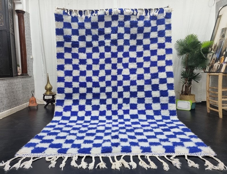 Handmade Moroccan Berber Wool Rug Blue White Chess Design 9.84x6.56ft: Handmade Moroccan Berber Wool Rug Blue White Chess Design 9.84x6.56ft Experience the charm of Moroccan craftsmanship with this stunning blue and white handmade Berber wool rug. Skillfully handwoven in