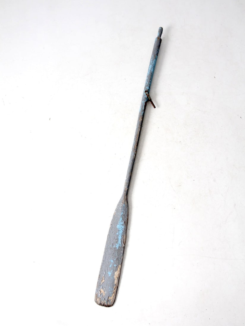 Vintage Nautical Wooden Oar 82 Inch Sky Blue Decor: Vintage Nautical Wooden Oar 82 Inch Sky Blue Decor This vintage painted wooden oar embodies a classic nautical charm, featuring beautifully aged sky blue paint that adds character. It serves as a marv