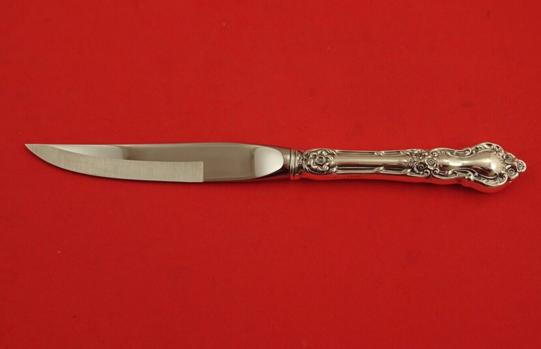 Wallace Meadow Rose Sterling Silver Steak Knife 8 3/8 Beveled Blade: Wallace Meadow Rose Sterling Silver Steak Knife 8 3/8 Beveled Blade Experience the elegance of dining with the Meadow Rose steak knife by Wallace. Crafted from high-quality sterling silver, this knife