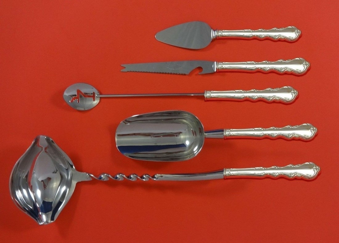 International Angelique Sterling Silver 5pc Cocktail Party Bar Set: International Angelique Sterling Silver 5pc Cocktail Party Bar Set Elevate your entertaining experience with the Angelique by International Sterling Silver Cocktail Party Bar Set. This exquisite 5-pie