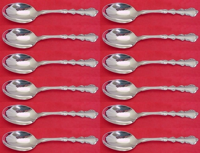 International Sterling Silver Angelique Soup Spoon Set 12 Pieces: International Sterling Silver Angelique Soup Spoon Set 12 Pieces Enhance your dining experience with this exquisite set of 12 place soup spoons from the Angelique pattern by International Silver. Craf