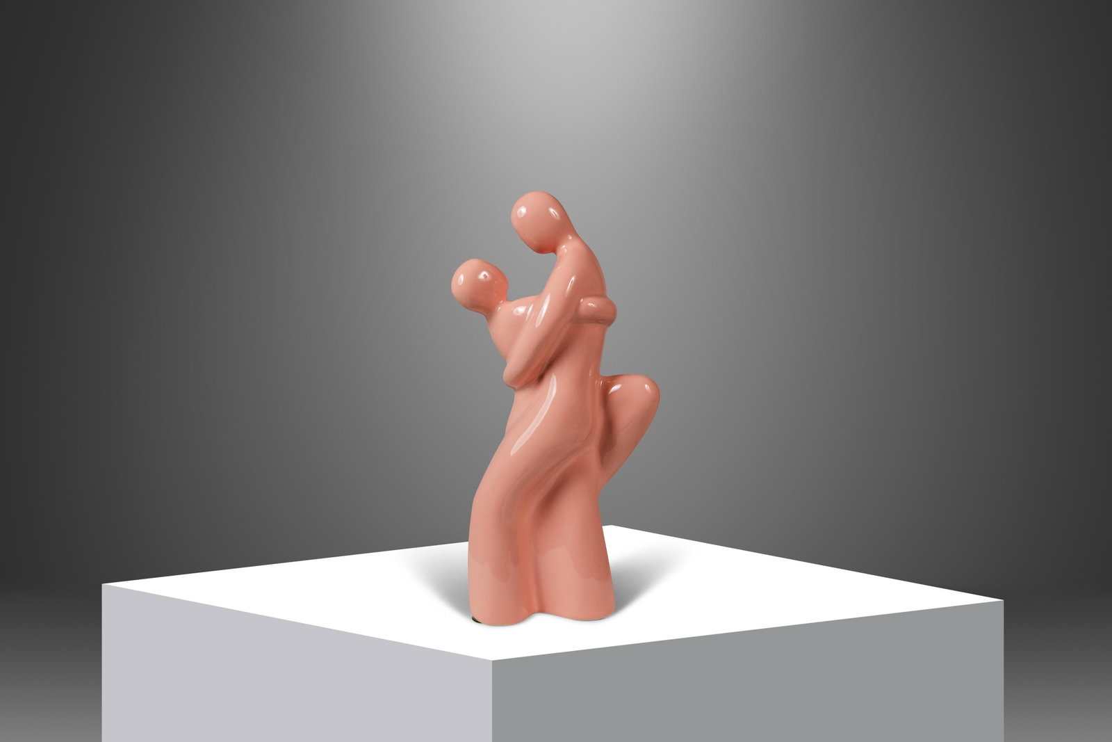 Haeger Pottery 1980s Abstract Tango Dancers Ceramic Sculpture: Haeger Pottery 1980s Abstract Tango Dancers Ceramic Sculpture This exquisite Mid-Century Modern Hollywood Regency ceramic sculpture titled "Tango Dancers" by Haeger Pottery captures a couple in a pass