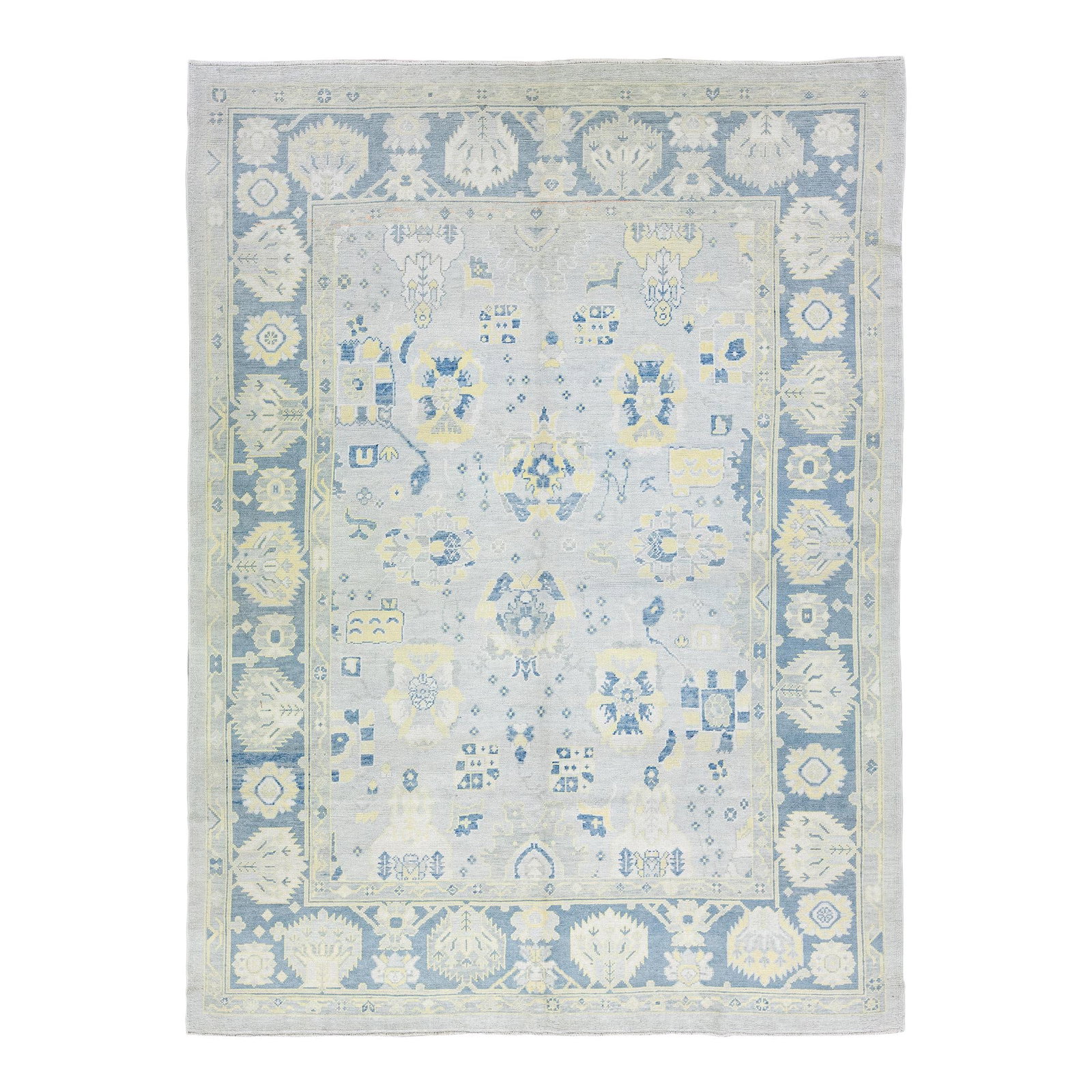 Gray Modern Oushak Handmade Wool Rug 9' x 12'4: Gray Modern Oushak Handmade Wool Rug 9' x 12'4 Enhance your living space with this stunning modern Oushak hand-knotted wool rug featuring a sophisticated gray field. Adorned with blue and yellow accen