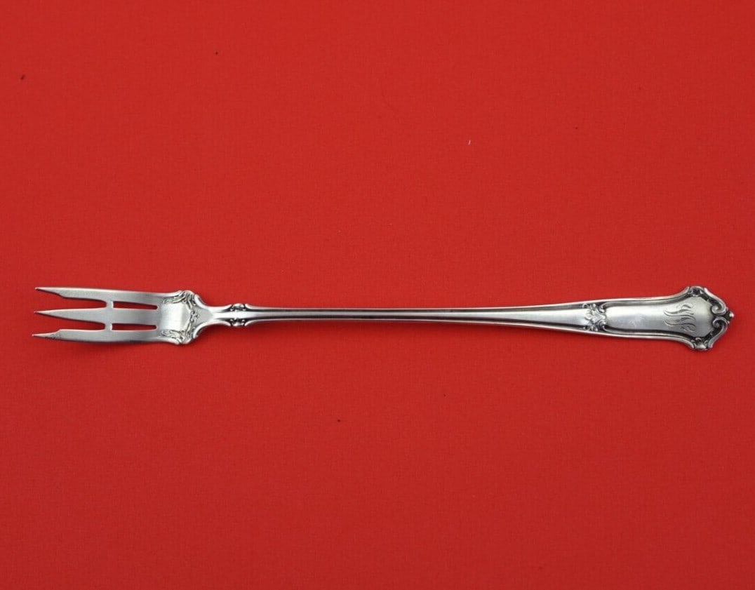 Wallace Saxon Sterling Silver Long Pickle Fork 7.5 Inch Serving Piece: Wallace Saxon Sterling Silver Long Pickle Fork 7.5 Inch Serving Piece This elegant serving fork, part of the Saxon pattern by Wallace, is crafted from high-quality sterling silver. Measuring 7 1/2 inc