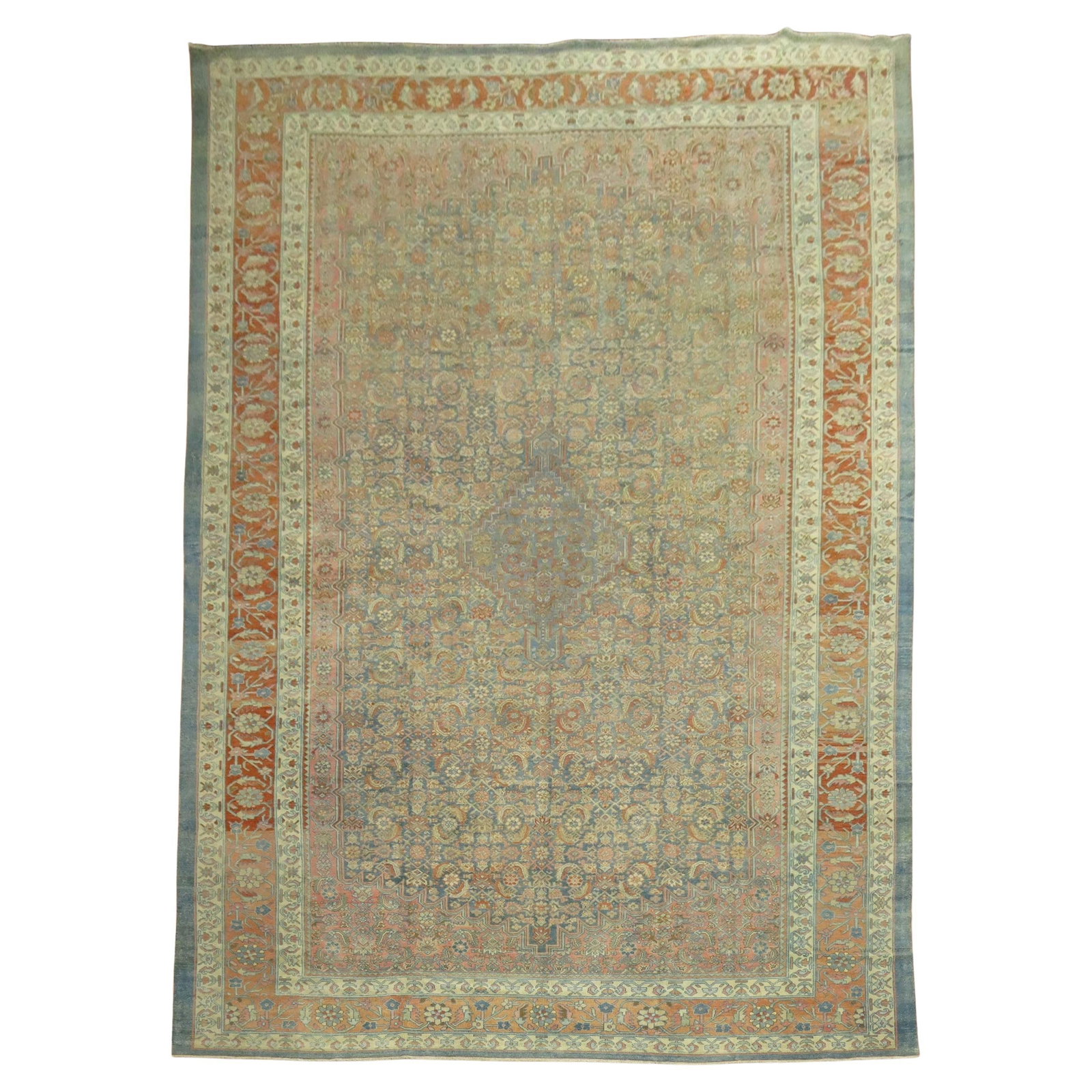 Antique Persian Bibikabad Rug 128 x 199 Hand-Knotted Wool: Antique Persian Bibikabad Rug 128 x 199 Hand-Knotted Wool This exquisite oversize Persian Bibikabad rug features a captivating Herati motif in a vivid palette of blues, pinks, and terracottas, embodyi