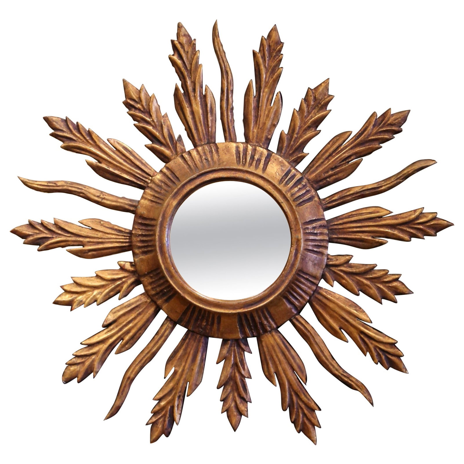 French Sunburst Mirror Hand-Carved Giltwood With Gold Leaf Finish 19.5 Inch: French Sunburst Mirror Hand-Carved Giltwood With Gold Leaf Finish 19.5 Inch This mid-century French sunburst wall mirror features a classic sunbeam design with hand-carved, leaf-shaped rays crafted in