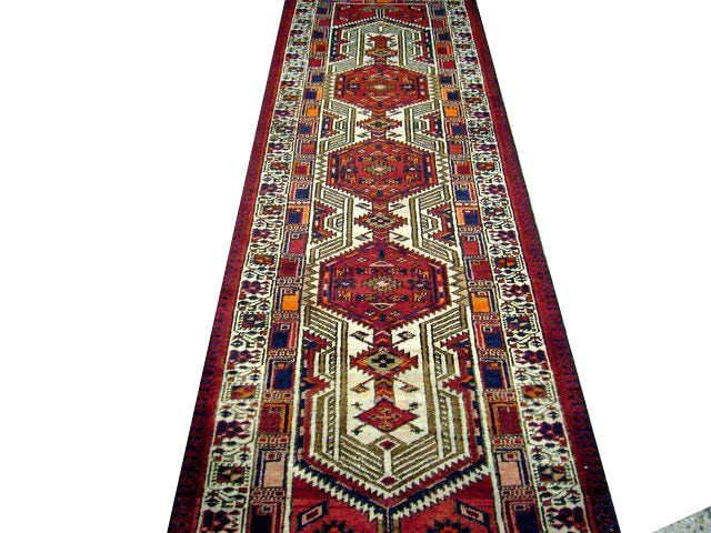 3' x 11' Handwoven Red Persian Heriz Runner from Iran: 3' x 11' Handwoven Red Persian Heriz Runner from Iran Free continental US Shipping Introducing a stunning 3' x 11' Red Persian Heriz Runner, a perfect blend of timeless elegance and exceptional crafts