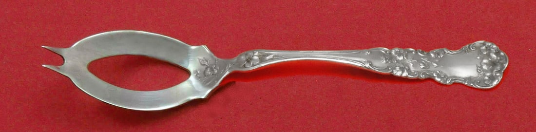 International Sterling Silver Pansy Pattern Olive Spoon 5 3/8 Inch (1 of 1)