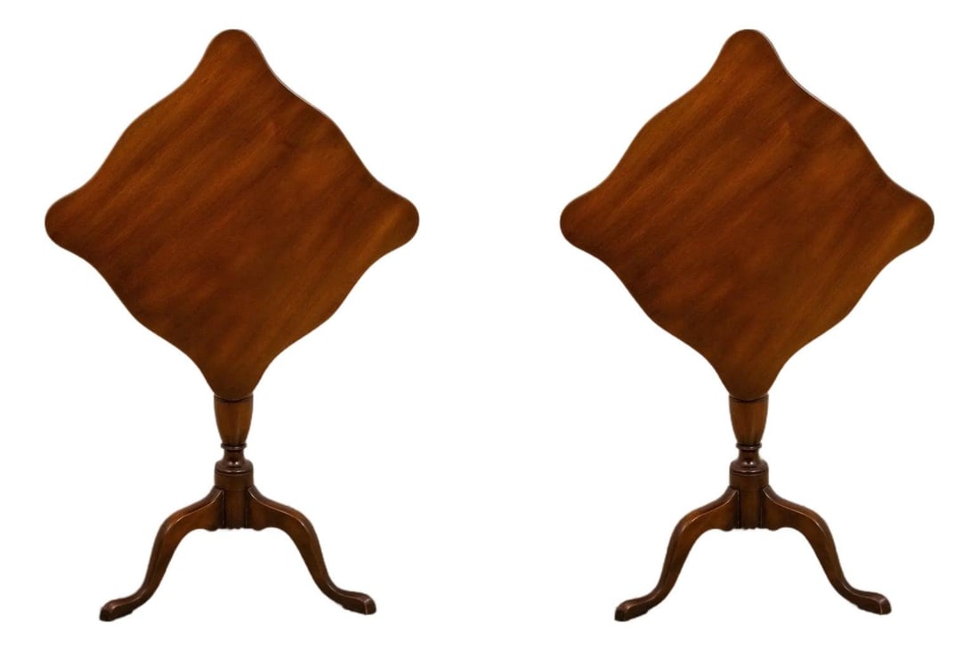 Pair of CW-20 Tilt Top Tripod Tables with Serpentine Tops: Pair of CW-20 Tilt Top Tripod Tables with Serpentine Tops This matching pair of Kittinger Colonial Williamsburg CW-20 tilt-top tables from the 1960s features a classic serpentine top and snake feet on