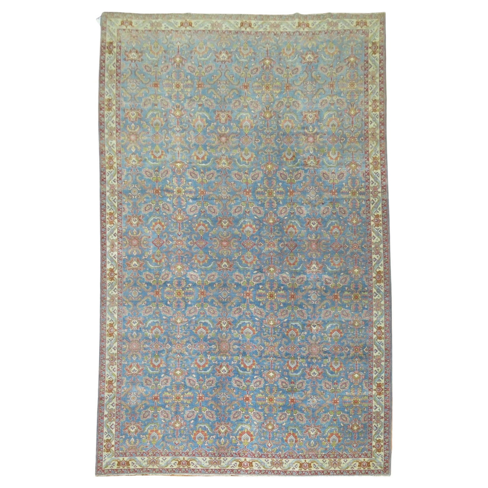 Blue Antique Persian Tabriz Rug Early 20th Century Hand-Woven Wool Agra Style: Blue Antique Persian Tabriz Rug Early 20th Century Hand-Woven Wool Agra Style Experience the elegance of a blue antique Persian Tabriz rug from the Zabihi Collection. This exquisite piece features a s