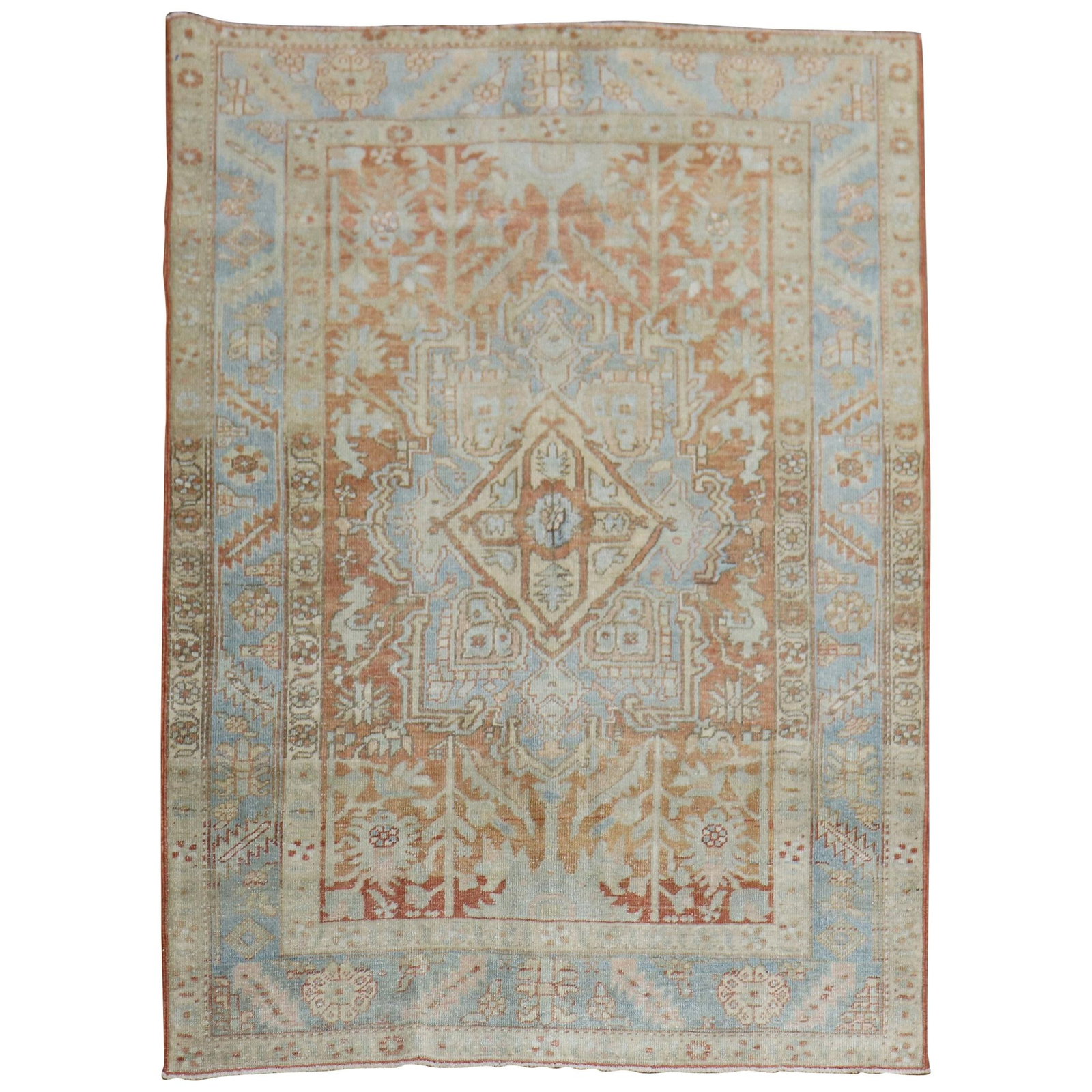 Apricot Soft Blue Hand-Woven Persian Heriz Rug 4'6" x 6'3": Apricot Soft Blue Hand-Woven Persian Heriz Rug 4'6" x 6'3" Enhance your space with this stunning Zabihi Collection Persian Heriz rug, featuring a beautiful blend of apricot rust and soft blue tones. H