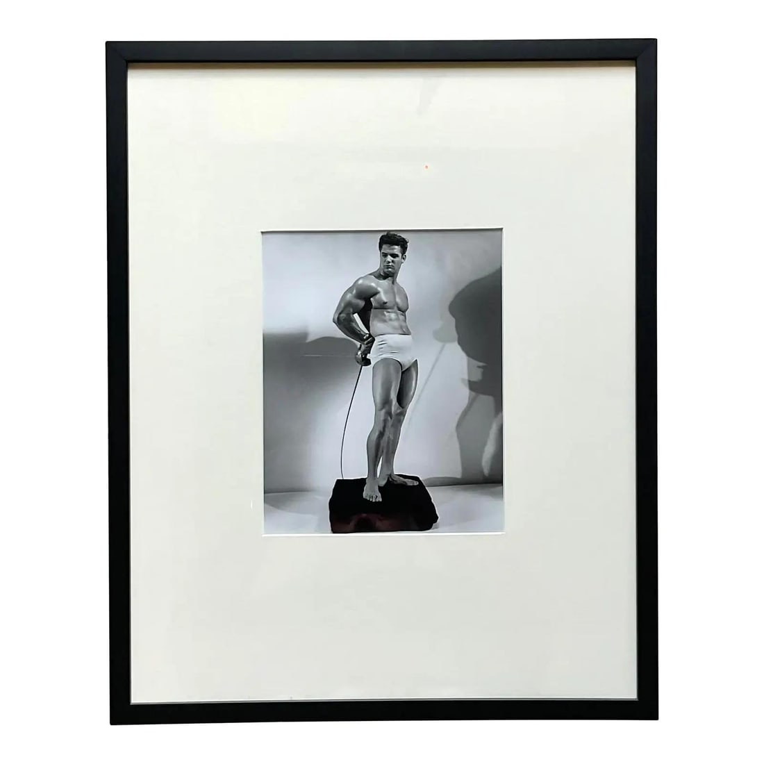 Mid Century Boho Bruce of LA Framed Photograph of Man with Fencing Sword: Mid Century Boho Bruce of LA Framed Photograph of Man with Fencing Sword Enhance your living space with this exquisite mid-20th century vintage Bruce of LA photograph. This stunning black-and-white po