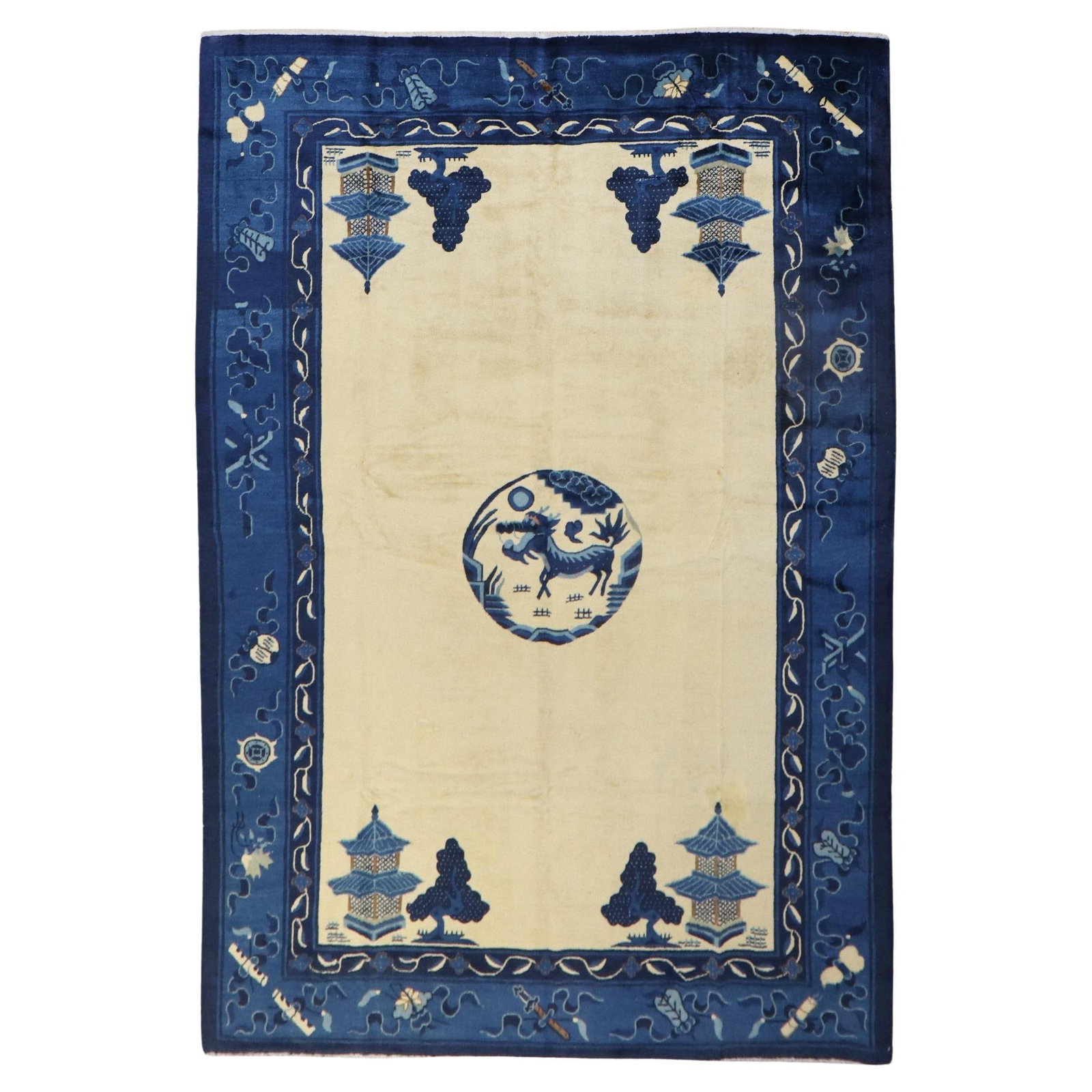 Hand-Woven Chinese Wool Rug with Blue Dragon Motif 74 x 104 Inch: Hand-Woven Chinese Wool Rug with Blue Dragon Motif 74 x 104 Inch This antique Chinese Dragon rug is a stunning representation of early 20th century craftsmanship. Hand-woven from wool, this Empire-sty