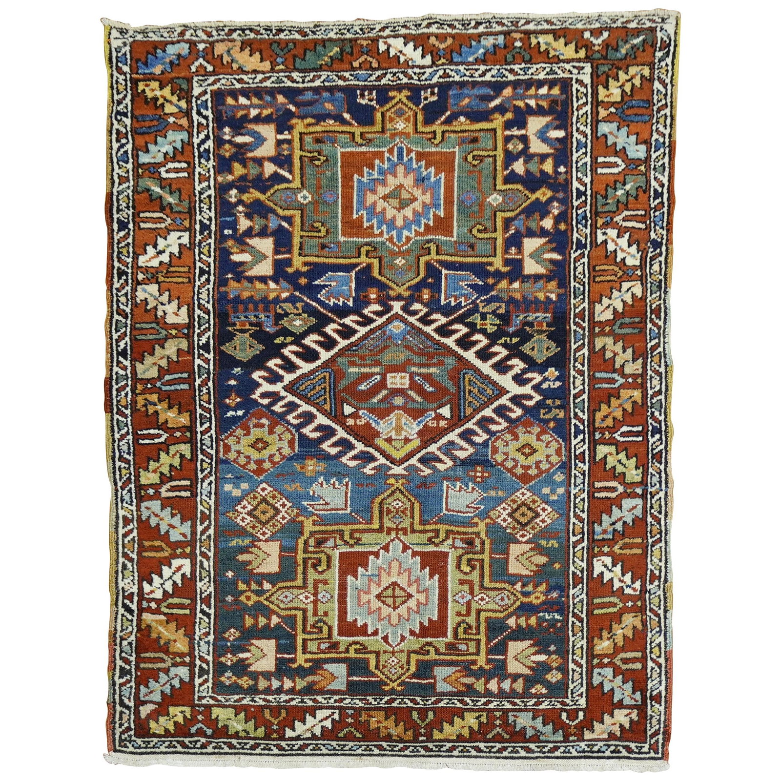 Antique Persian Heriz Rug 3'4" x 4'5" Navy Blue Wool Hand-Woven: Antique Persian Heriz Rug 3'4" x 4'5" Navy Blue Wool Hand-Woven Discover the beauty of this antique Persian Heriz rug, meticulously hand-woven from high-quality wool. Featuring a striking geometric mo