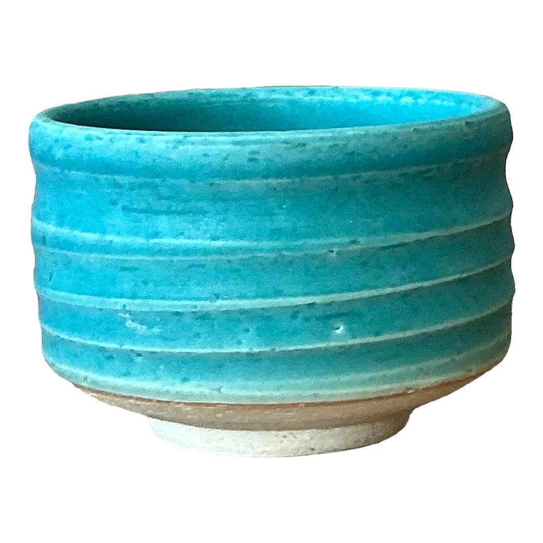 Aqua Blue Studio Pottery Bowl with Ribbed Design and Carved Signature: Aqua Blue Studio Pottery Bowl with Ribbed Design and Carved Signature This vintage studio pottery bowl features a vibrant matte aqua blue glaze with subtle speckling and pronounced horizontal ribbing.