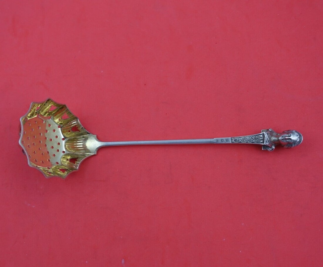 Gorham Bust Sterling Silver Sugar Sifter Ladle 7 1/4 Inch: Gorham Bust Sterling Silver Sugar Sifter Ladle 7 1/4 Inch This exquisite ladle from Gorham features the elegant Bust pattern and is crafted from sterling silver. The sugar sifter ladle showcases a bea