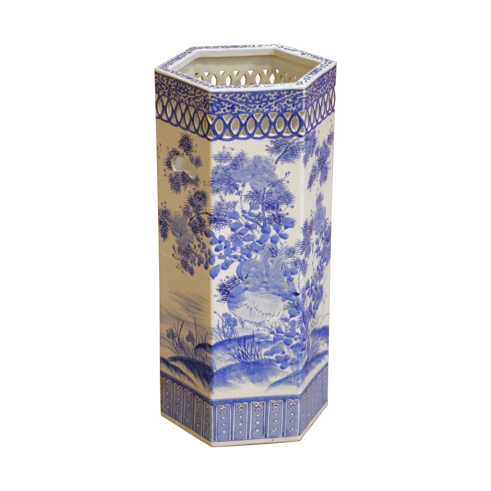 Hand-Painted Chinese Blue and White Porcelain Mid-Century Umbrella Stand: Hand-Painted Chinese Blue and White Porcelain Mid-Century Umbrella Stand This mid-century Chinese export umbrella stand is crafted from blue and white porcelain, featuring a tall hexagonal shape with