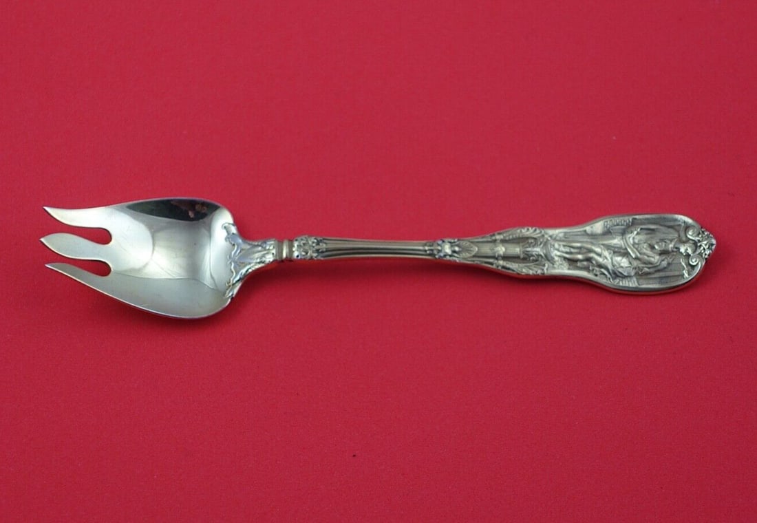 Gorham Mythologique Sterling Silver Ice Cream Fork Vermeil 5 3/8": Gorham Mythologique Sterling Silver Ice Cream Fork Vermeil 5 3/8" Indulge in a touch of elegance with this exquisite ice cream fork from the Mythologique pattern by Gorham. Crafted from sterling